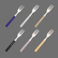 Set of forks. Metallic, wooden forks. Royalty Free Stock Photo